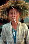 Stock Culture Woman with hat smoking in Indonesia (Date Unknown)

[keywords]smoking, hat, indonesia[/keywords]